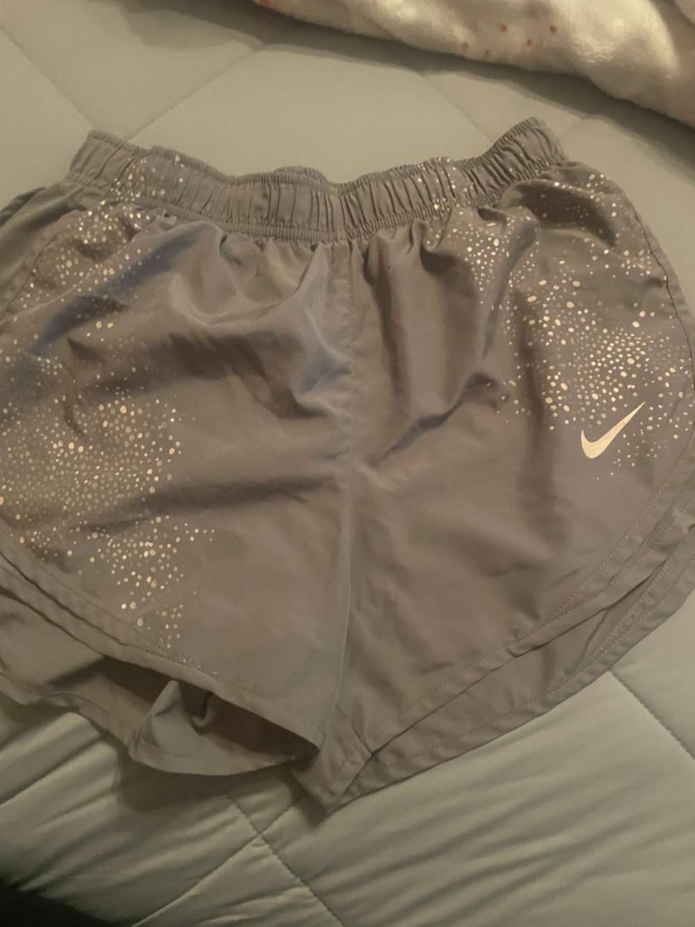 Nike Women's Light Gray Athletic Shorts with Reflective Dot Accents Sz Medium